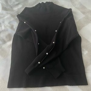 Turtleneck sweater with pearls